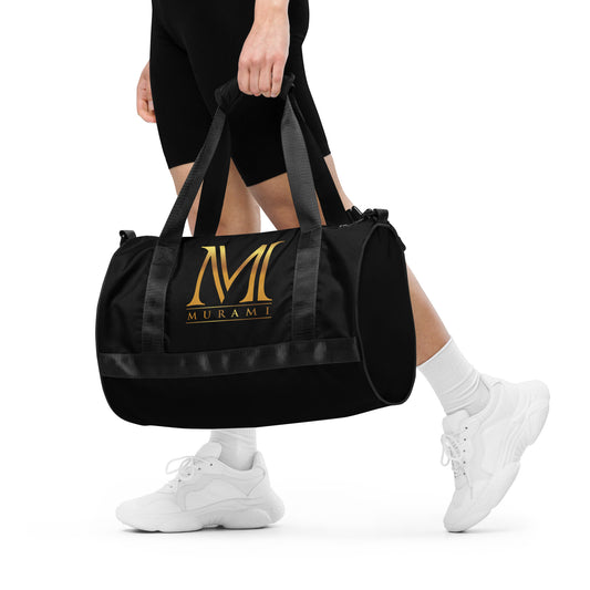 Athlete holding Murami premium gym bag