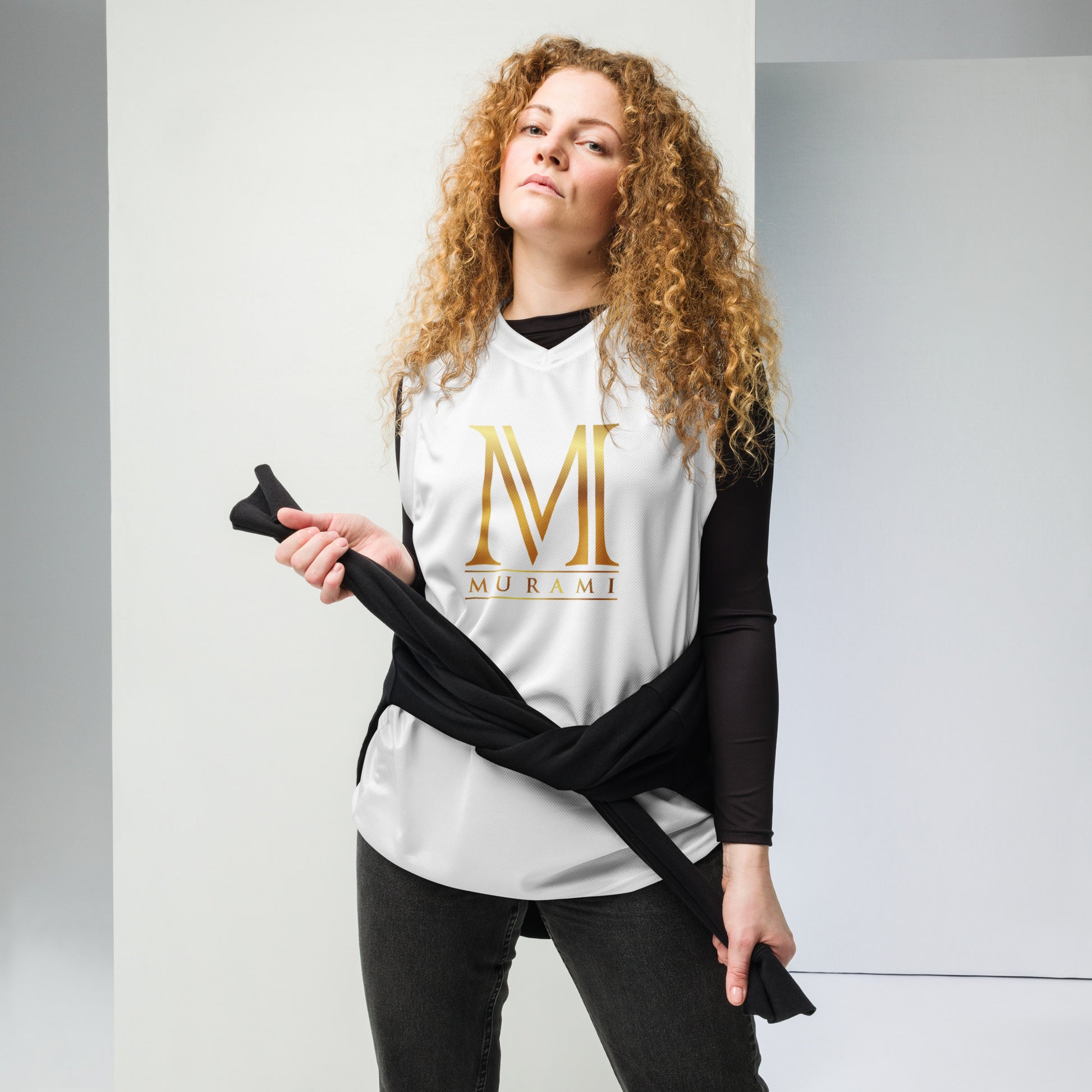 Female model wearing Murami gold jersey - white edition